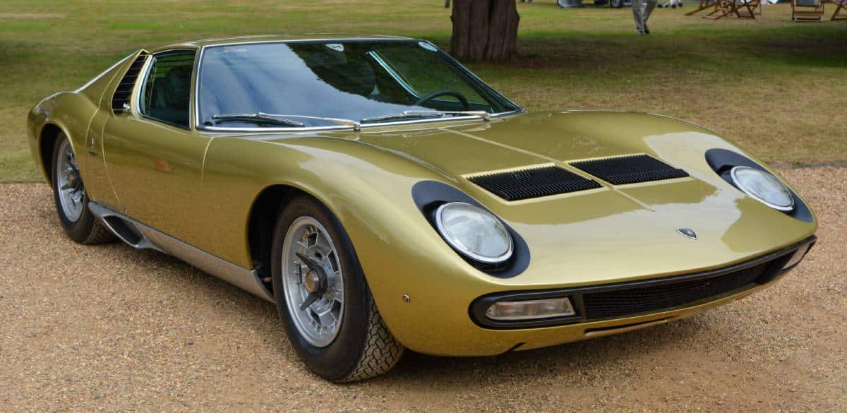 Vintage silver sports car with the number